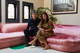 Robert and Cortney Novogratz at home on their pink sofa